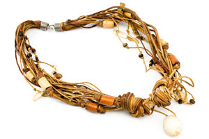 necklace with leather strips and a seashell