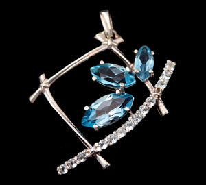 platinum pendant with gemstones